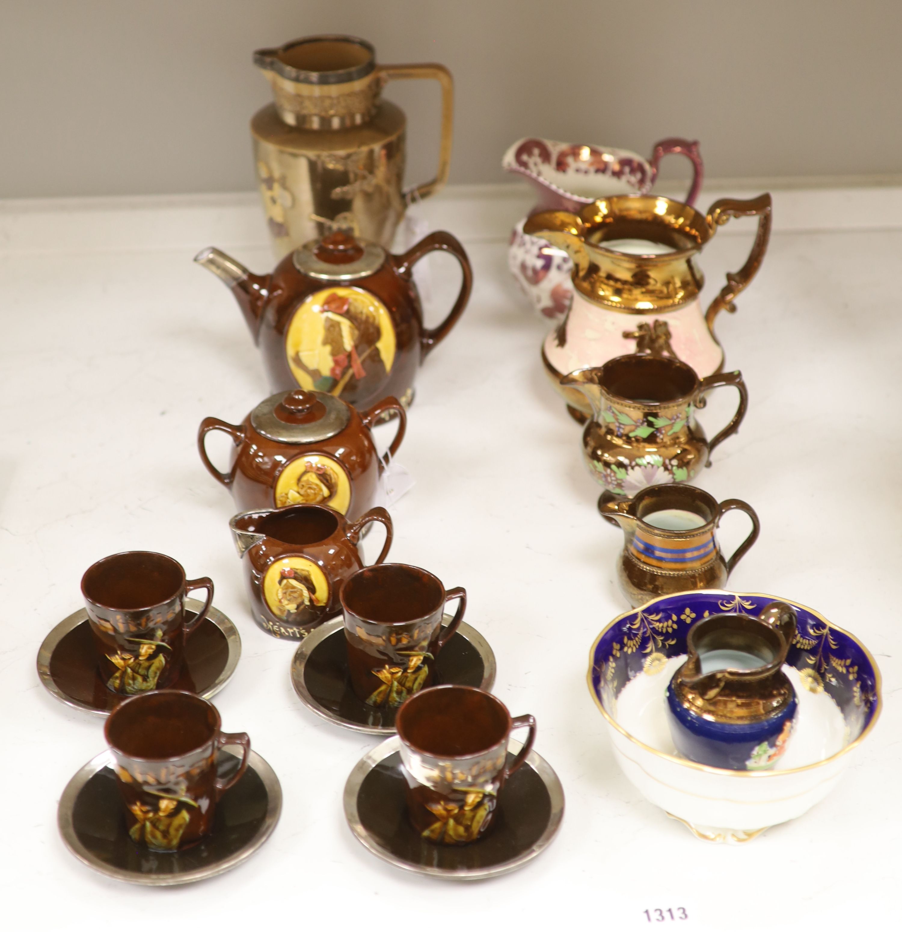 A Royal Doulton silver mounted Hearts Content tea service, and a Doulton Japanese inspired silver mounted jug, assorted lustre jugs